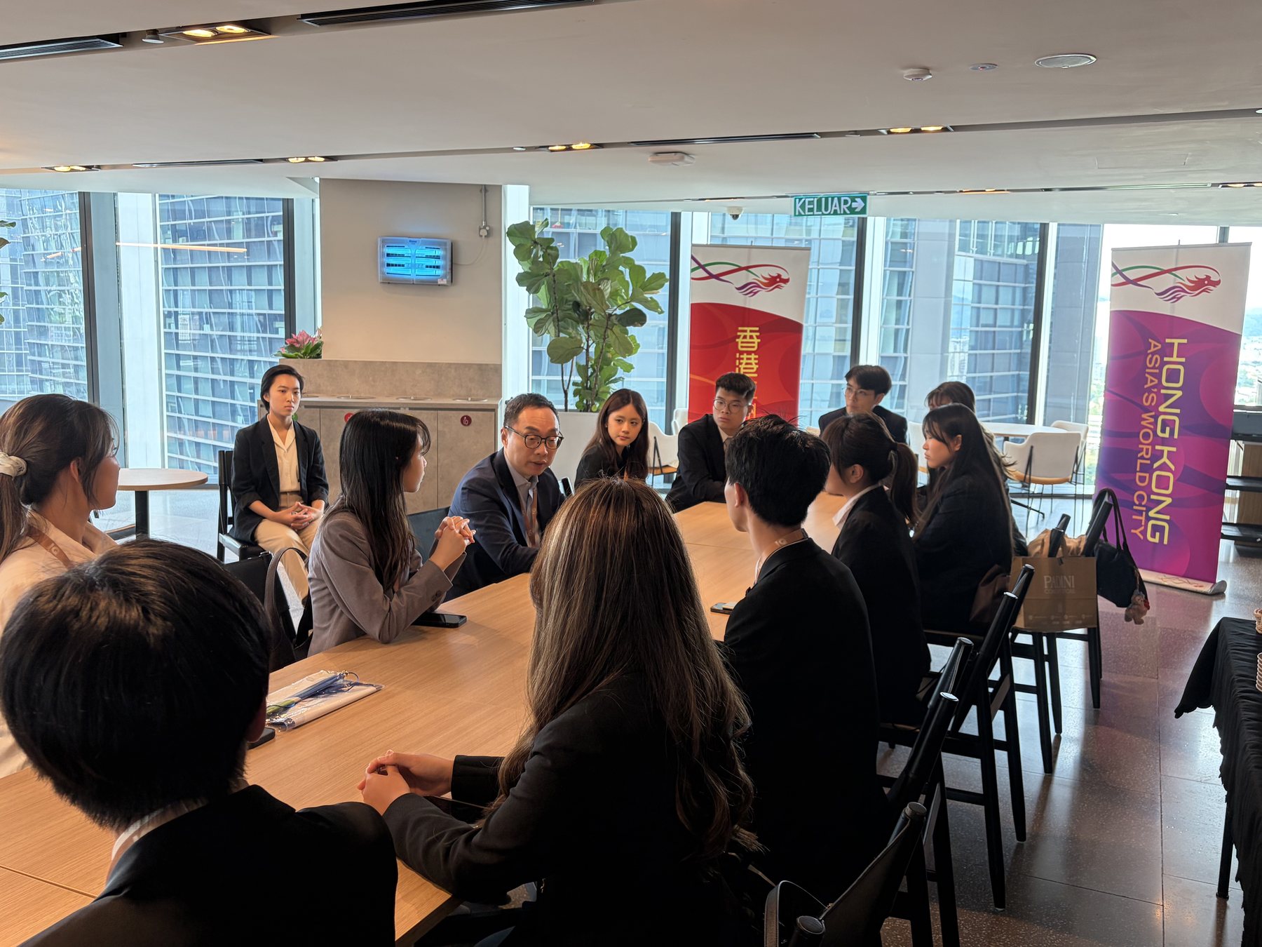 HKMU student ambassadors attending an office briefing
